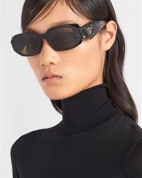 Prada Symbole Sunglasses Black .